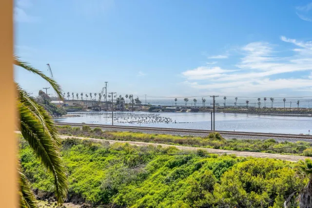 a view of beach and an ocean