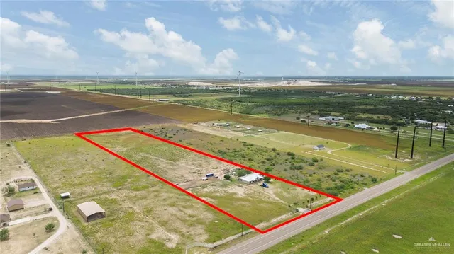 a view of an ocean and a houses
