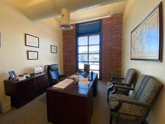 1925 East 2nd Avenue Tampa, FL 33605 - Photo 7 of 17 a work room with furniture and windows