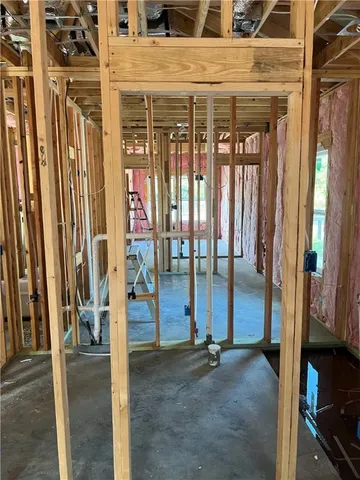 a view of an entryway with a front door