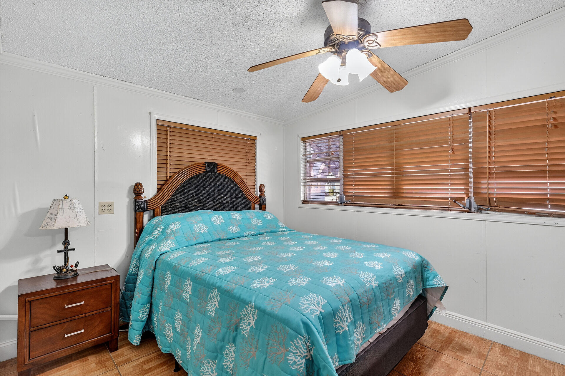 65821 Overseas Highway, Unit 112 Long Key, FL 33001 - Photo 20 of 49 a bedroom with a bed and a window