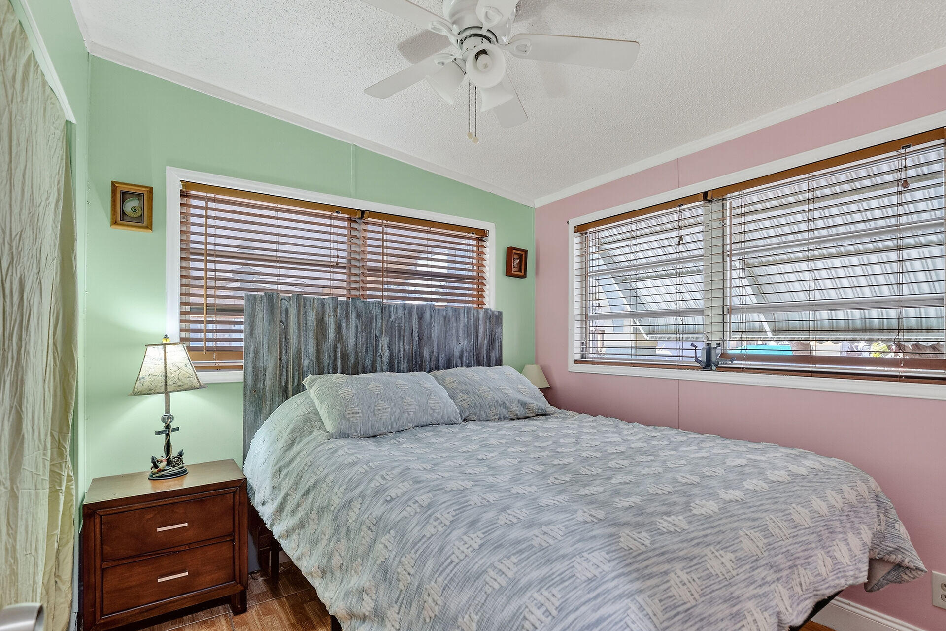 65821 Overseas Highway, Unit 112 Long Key, FL 33001 - Photo 23 of 49 a bedroom with a bed and a large window