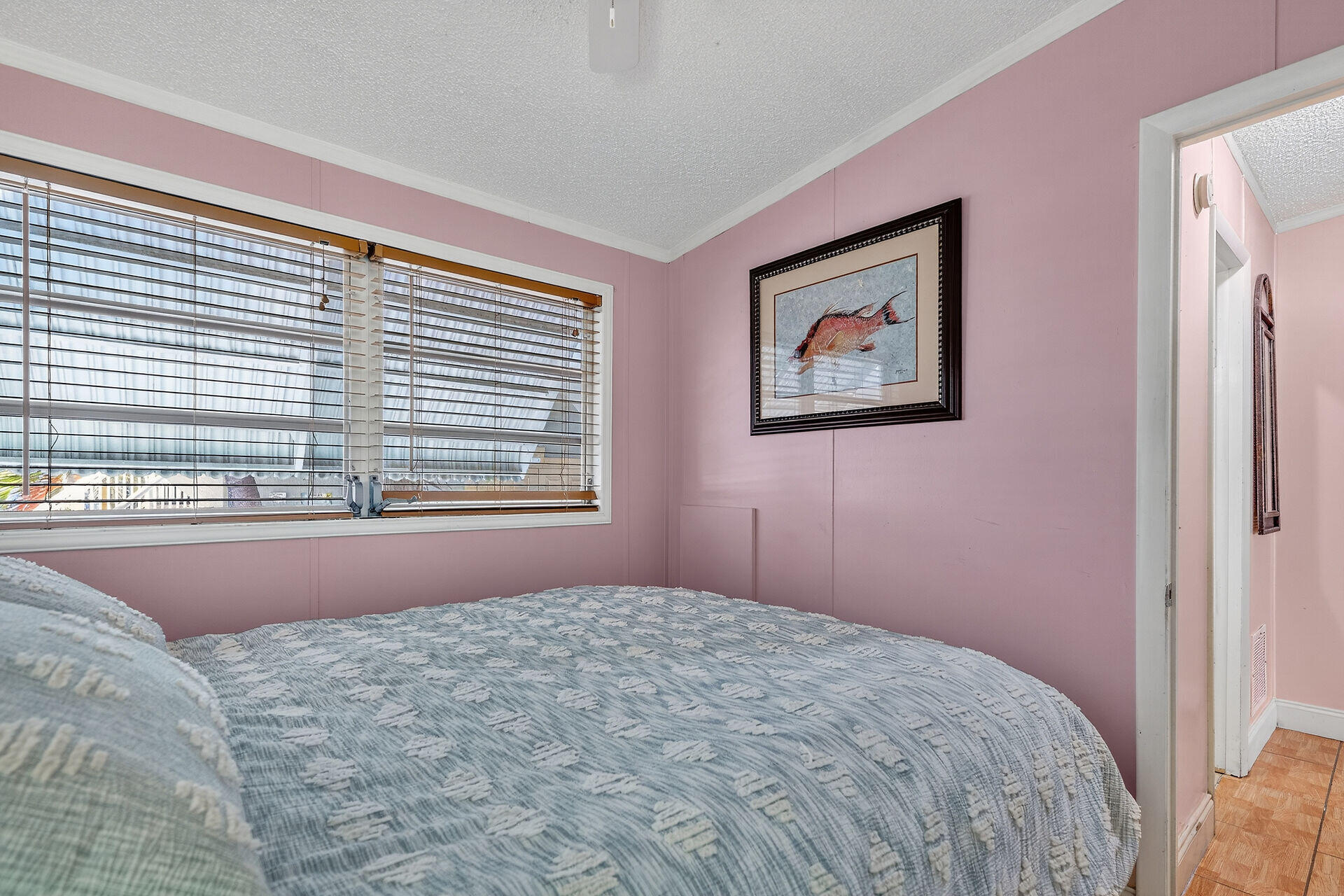 65821 Overseas Highway, Unit 112 Long Key, FL 33001 - Photo 24 of 49 a bedroom with a bed and a window