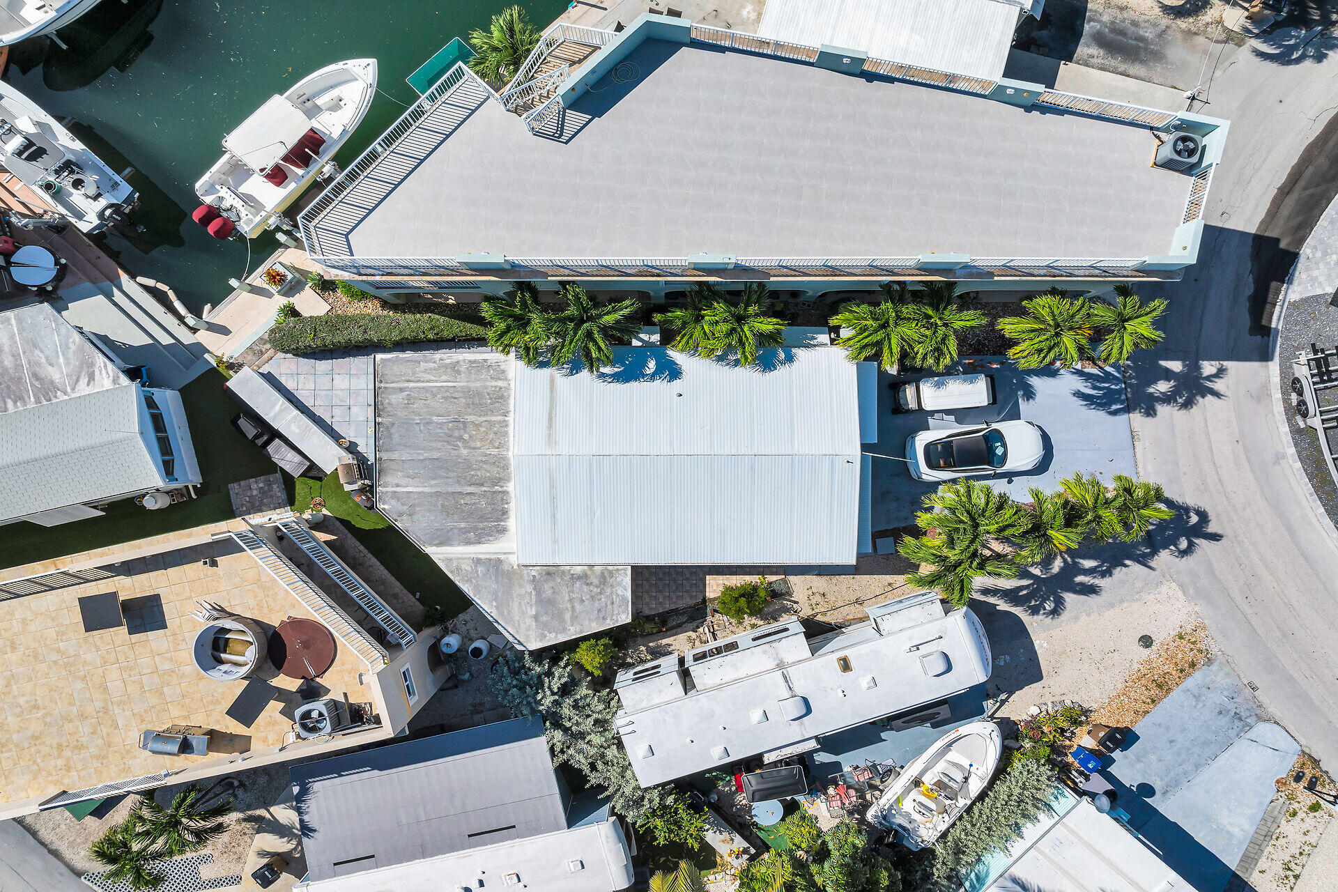 65821 Overseas Highway, Unit 112 Long Key, FL 33001 - Photo 25 of 49 an aerial view of a house with a yard and garden