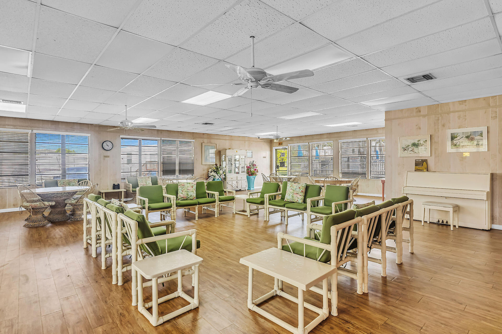 65821 Overseas Highway, Unit 112 Long Key, FL 33001 - Photo 4 of 49 a view of a dining room with furniture window and wooden floor