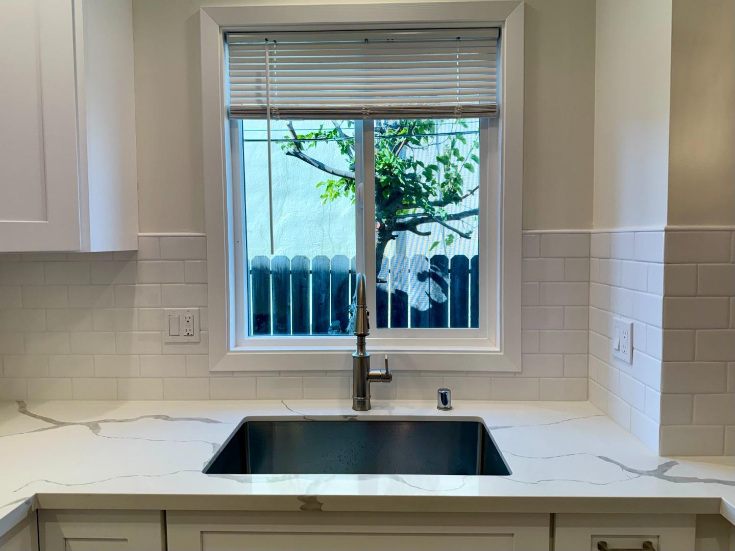 634 Fulton Street Redwood City, CA 94061 - Photo 12 of 24 a view of a sink and a window