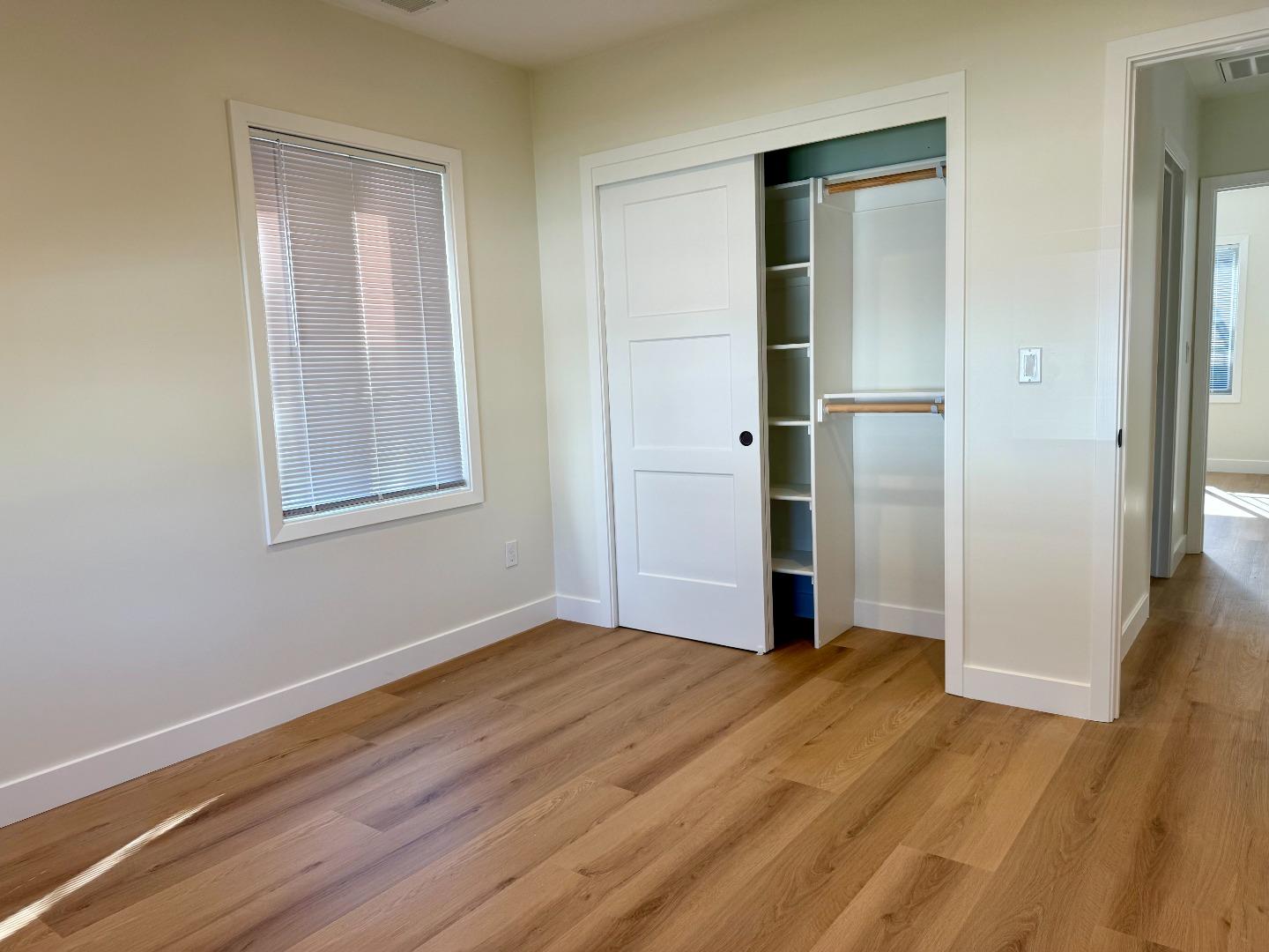 634 Fulton Street Redwood City, CA 94061 - Photo 21 of 24 a view of empty room with wooden floor