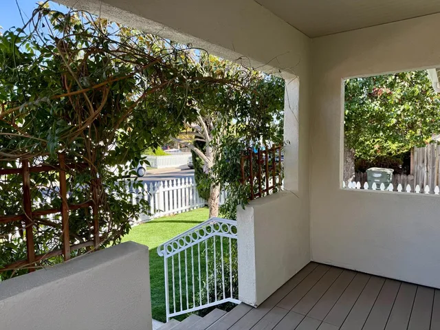 a porch with seating space