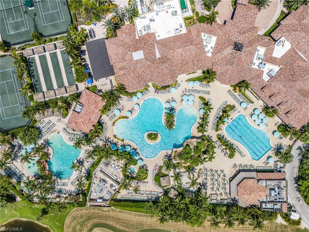 9113 Michael Circle, Unit 7 Naples, FL 34113 - Photo 34 of 34 an aerial view of a house with a swimming pool