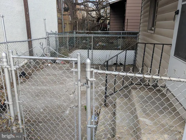 a view of a house with a street