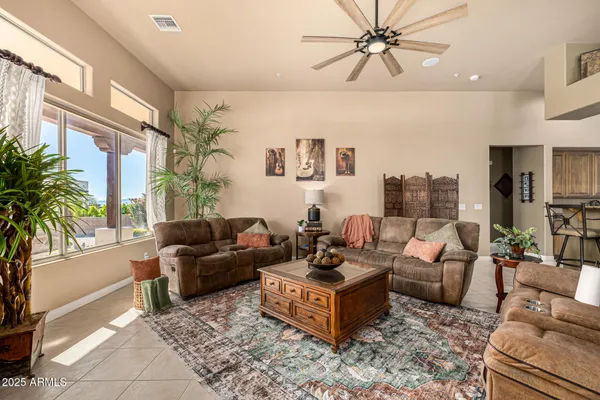 a view of a dining room with furniture window and outside view