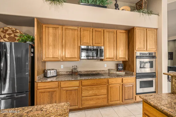 a large bathroom with a large tub sink and double vanity