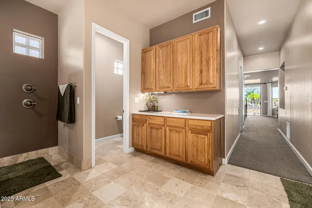 a view of a garage with stairs