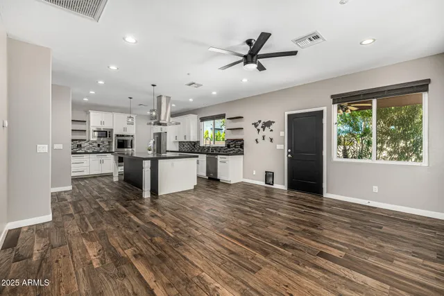 a view of a swimming pool with a patio