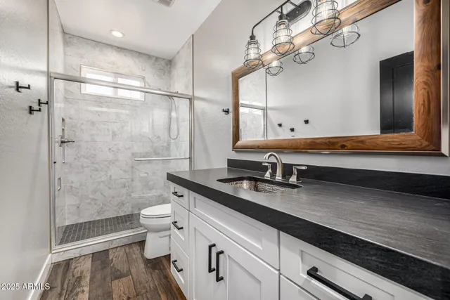 a view of a patio with a table and chairs