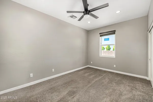 an aerial view of a house with a ocean view
