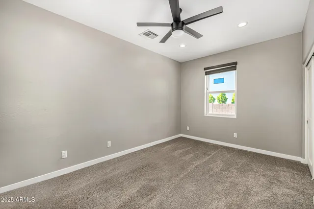 an aerial view of a house with a ocean view