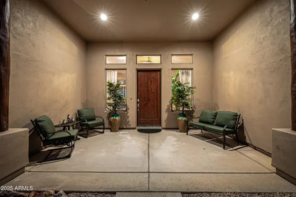 a view of a livingroom with furniture window and outside view