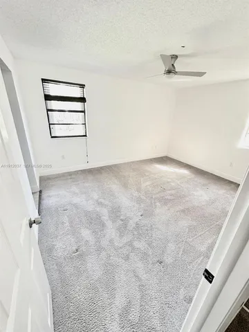 a view of small space with wooden floor