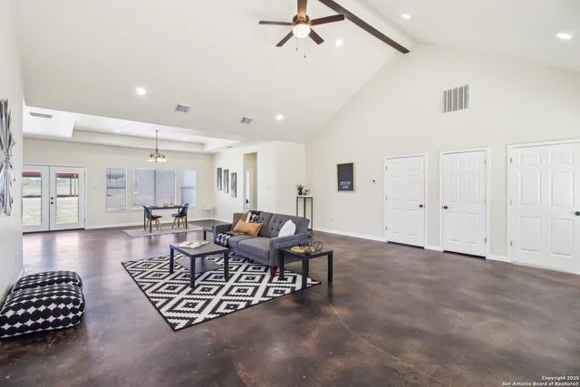 a dining room with wooden floor and breakfast area