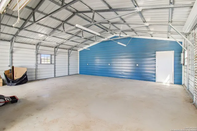 a picture of a bathroom with a shower