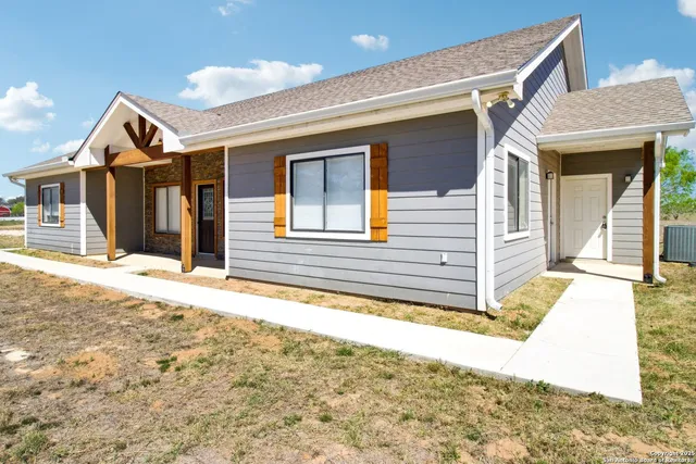 a view of house with a outdoor space