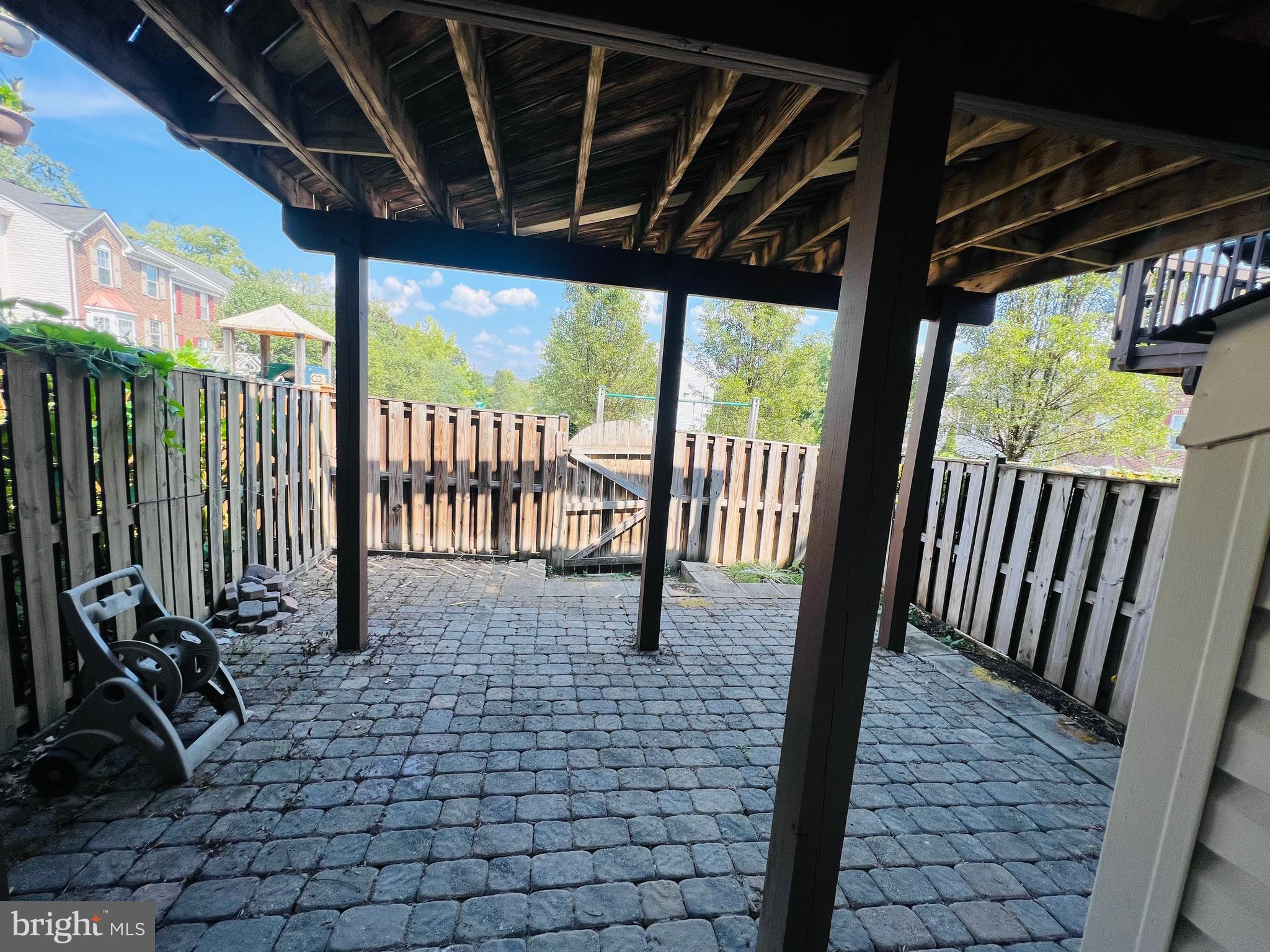 13251 Revillo Loop Woodbridge, VA 22191 - Photo 2 of 32 a view of a porch with wooden floor