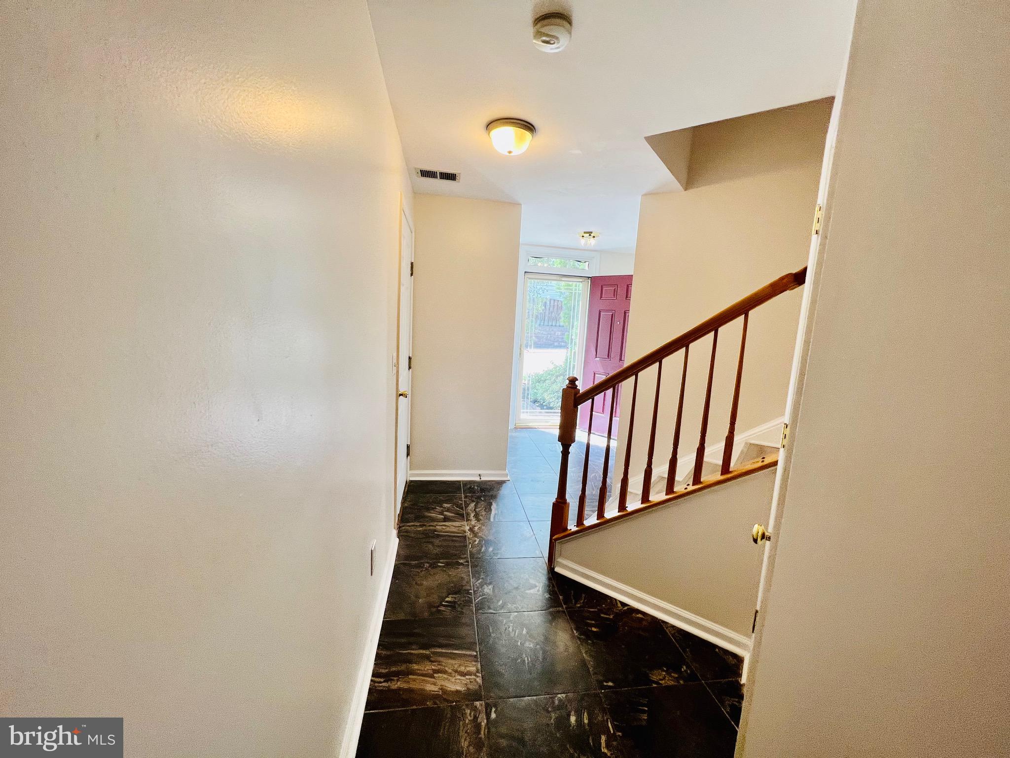 13251 Revillo Loop Woodbridge, VA 22191 - Photo 8 of 32 a view of a hallway with entryway