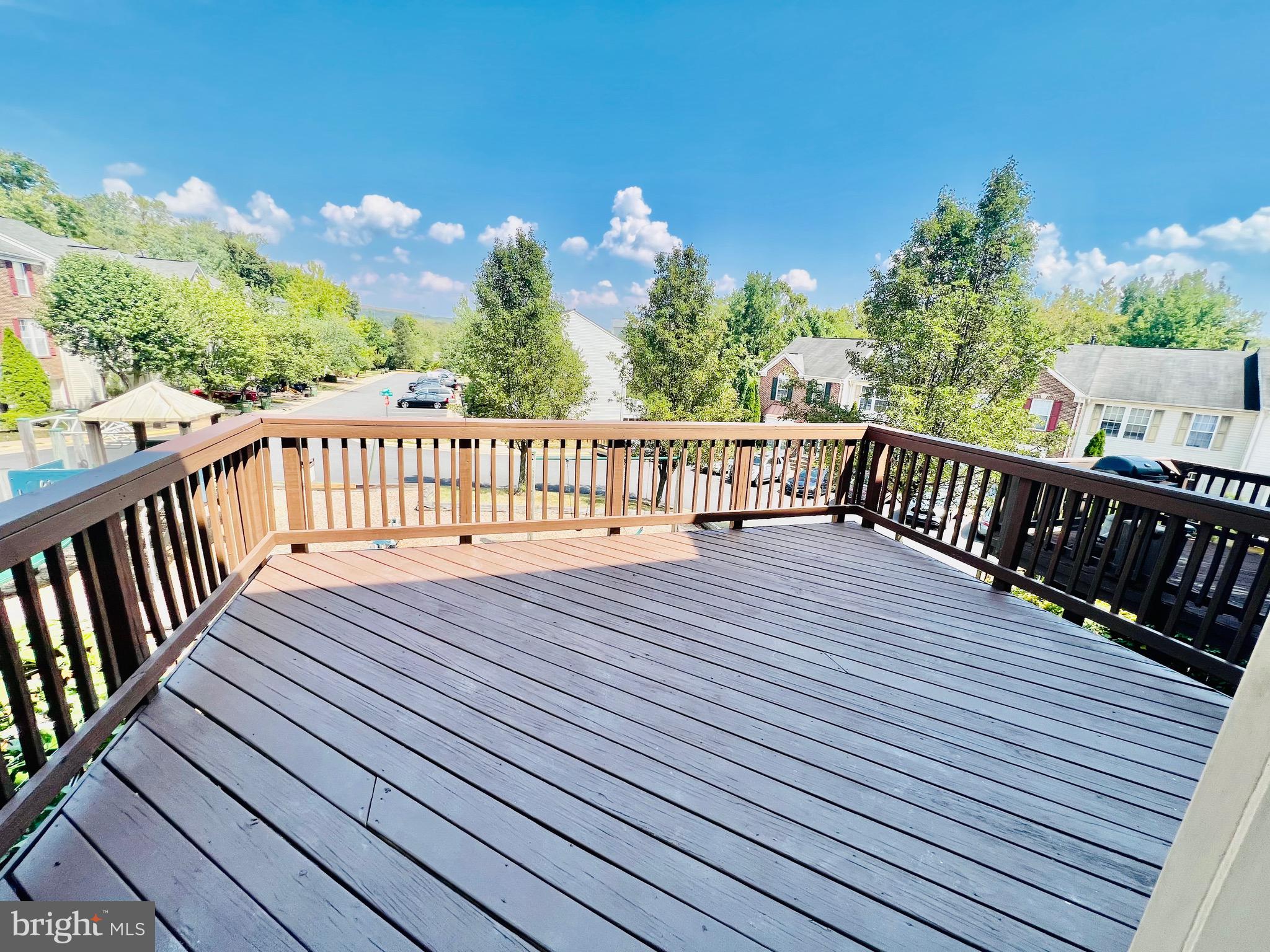 13251 Revillo Loop Woodbridge, VA 22191 - Photo 10 of 32 a view of deck with wooden floor and fence