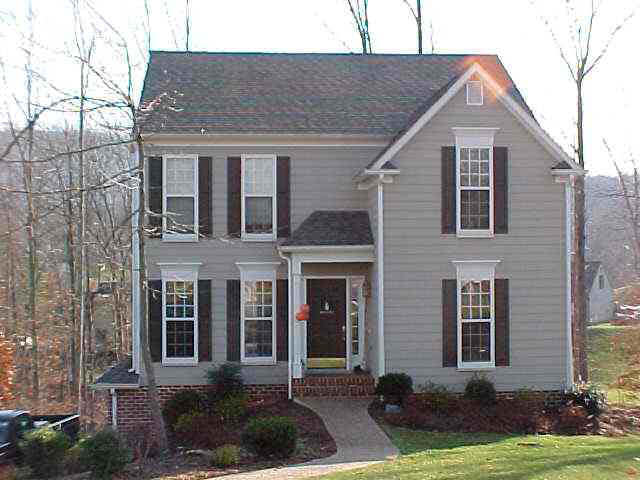 317 Starcrest Road Charlottesville, VA 22902 - Photo 1 of 2 a front view of a house with garden