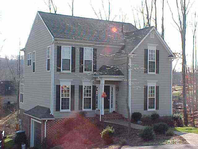 317 Starcrest Road Charlottesville, VA 22902 - Photo 2 of 2 a front view of a house with garden