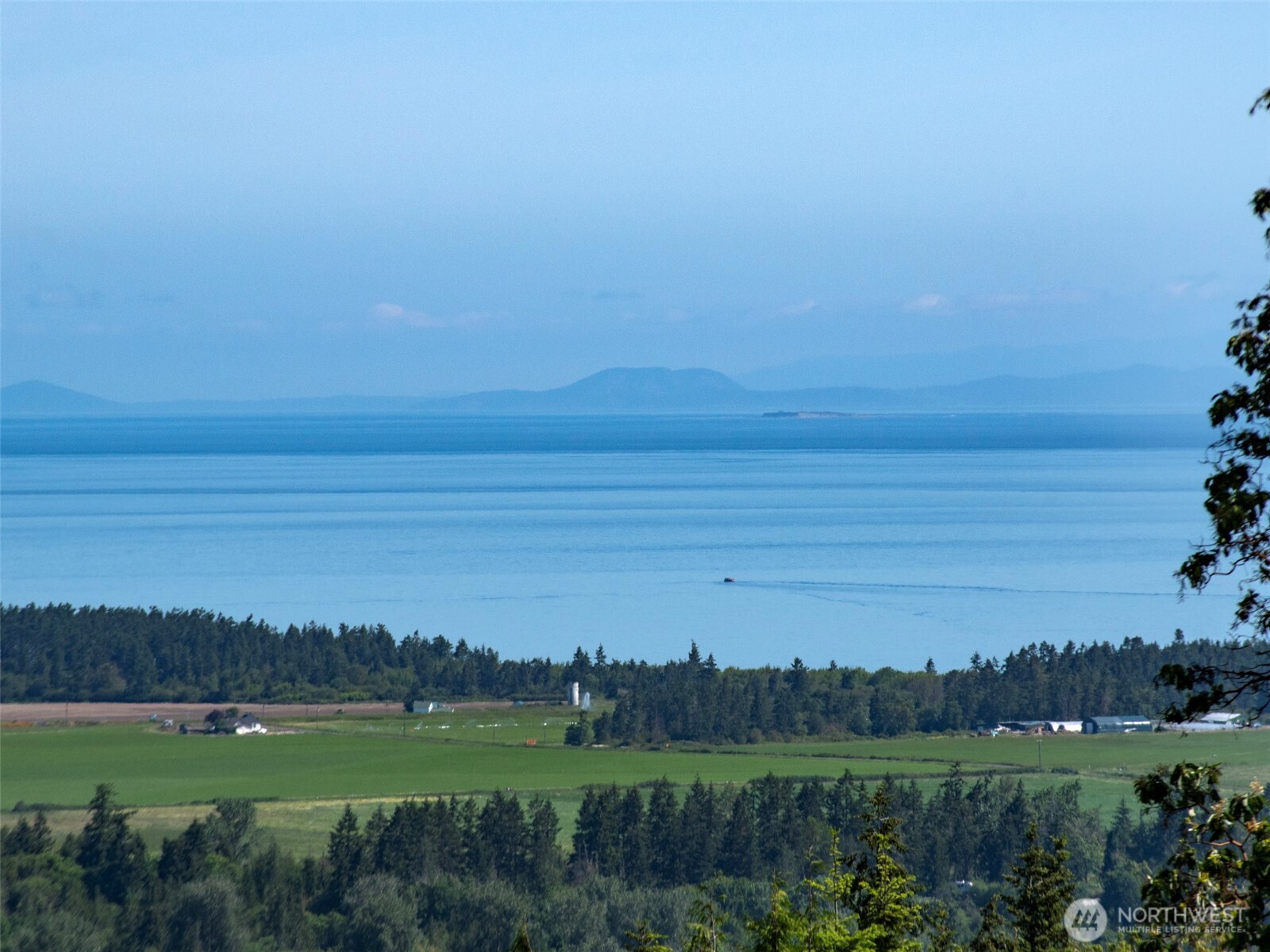 -nka Owls Nest Road Sequim, WA 98382 - Photo 30 of 38 a view of a lake with houses in the back