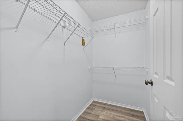 a view of a room with racks on the wall