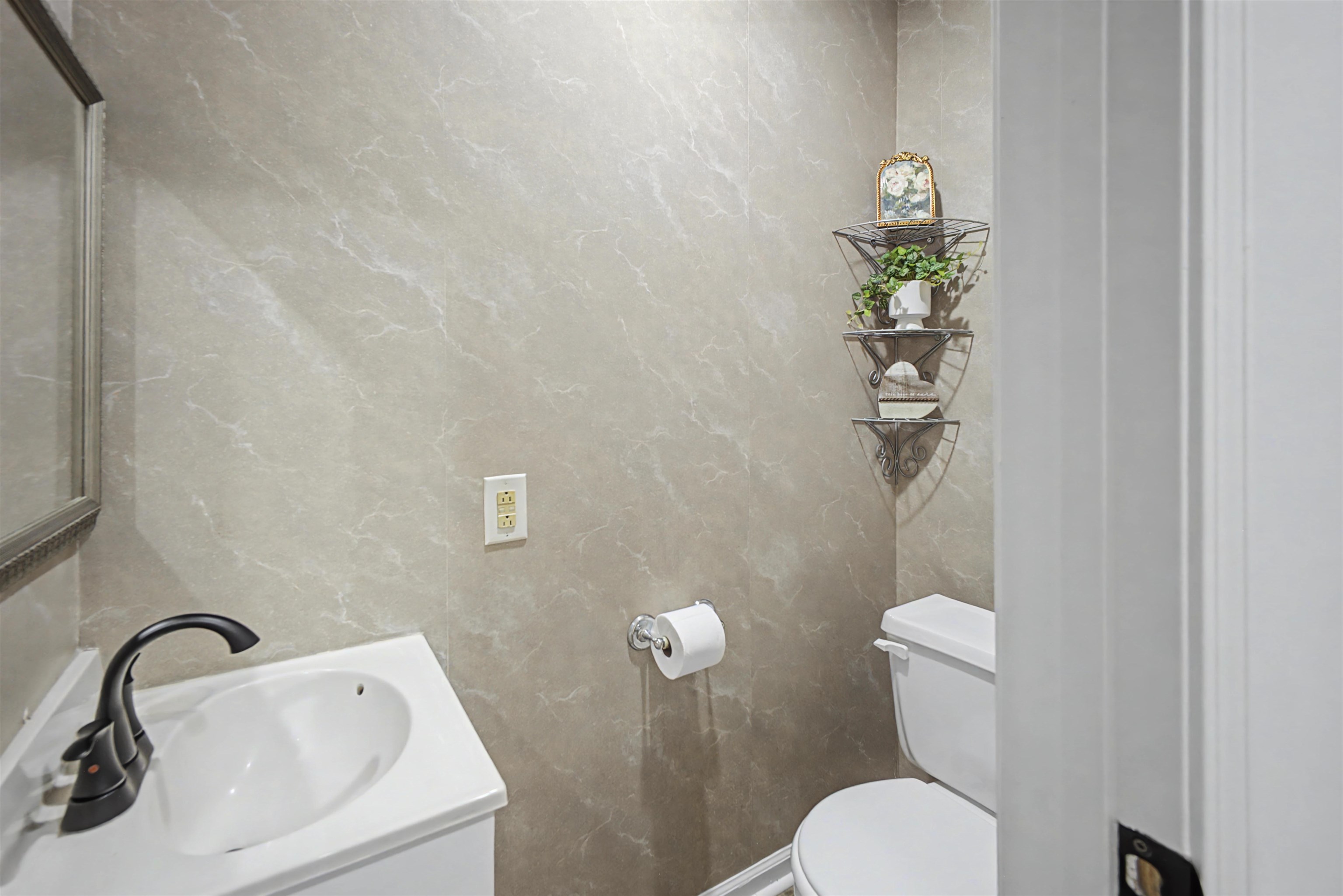 632 Cullum Road Munford, TN 38058 - Photo 17 of 38 Half bath featuring vanity and toilet