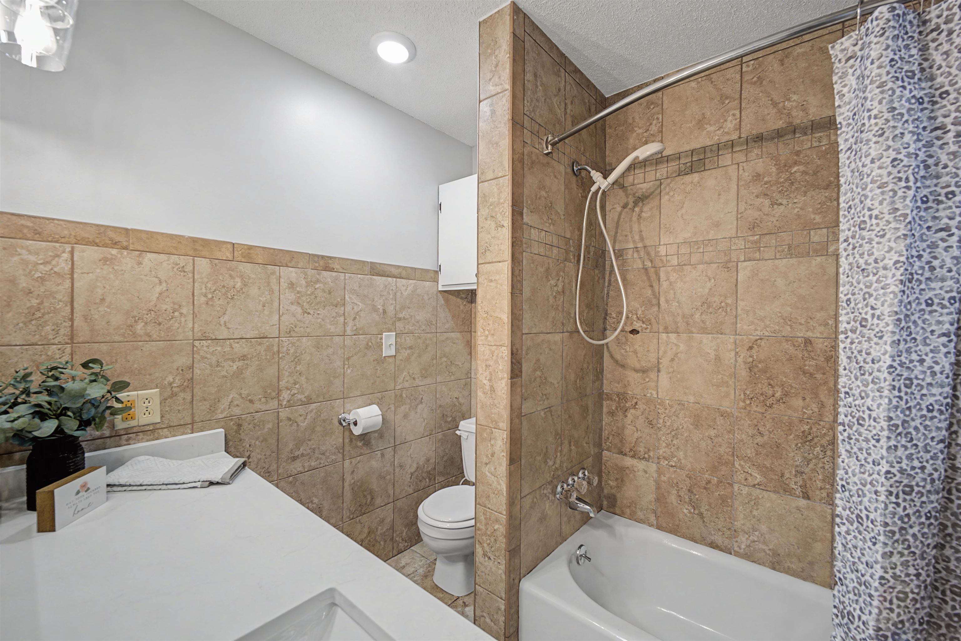 632 Cullum Road Munford, TN 38058 - Photo 24 of 38 Full bath with shower / bathtub combination with curtain, tile walls, vanity, a textured ceiling, and recessed lighting