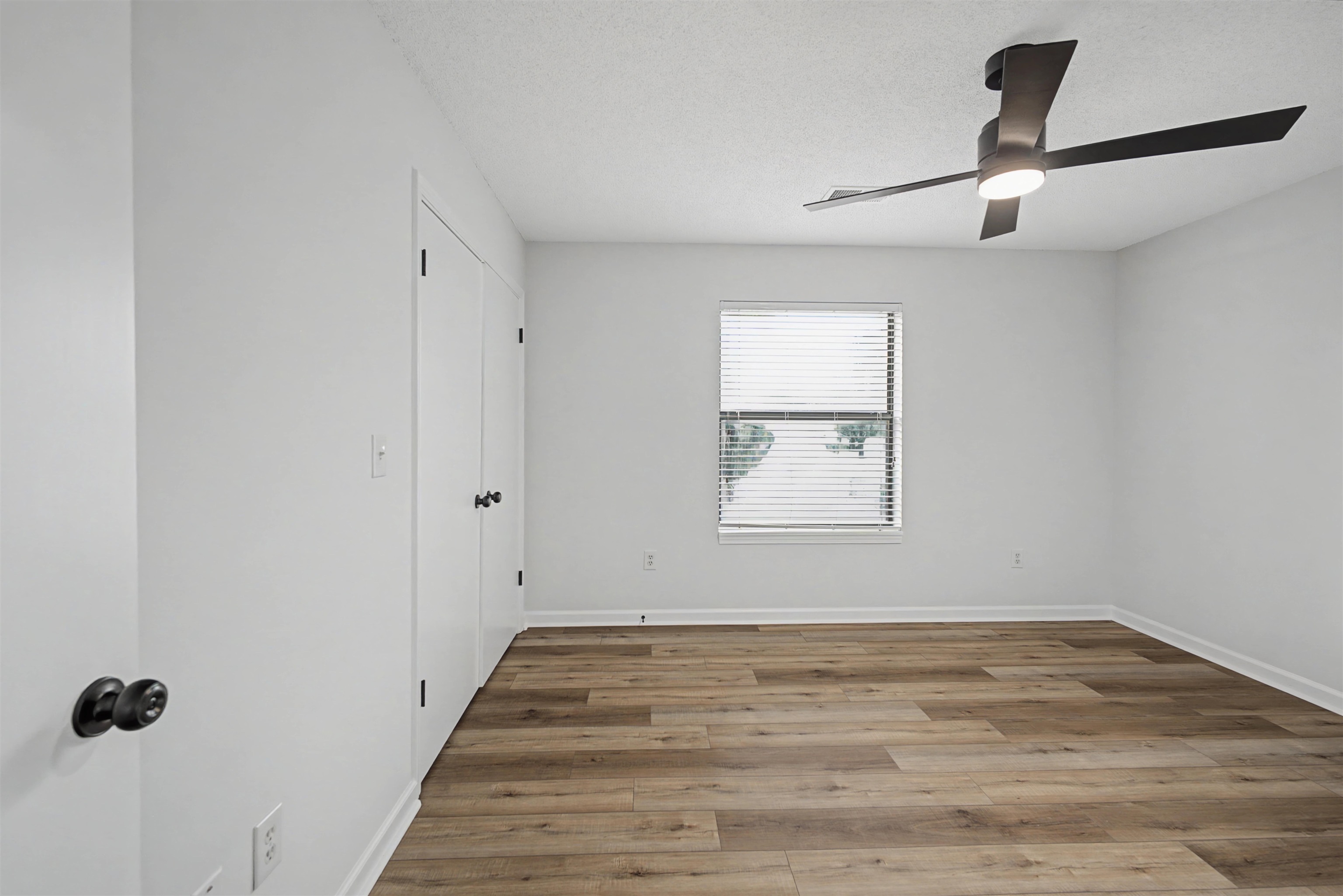 632 Cullum Road Munford, TN 38058 - Photo 28 of 38 Unfurnished room featuring light wood-style flooring and a ceiling fan
