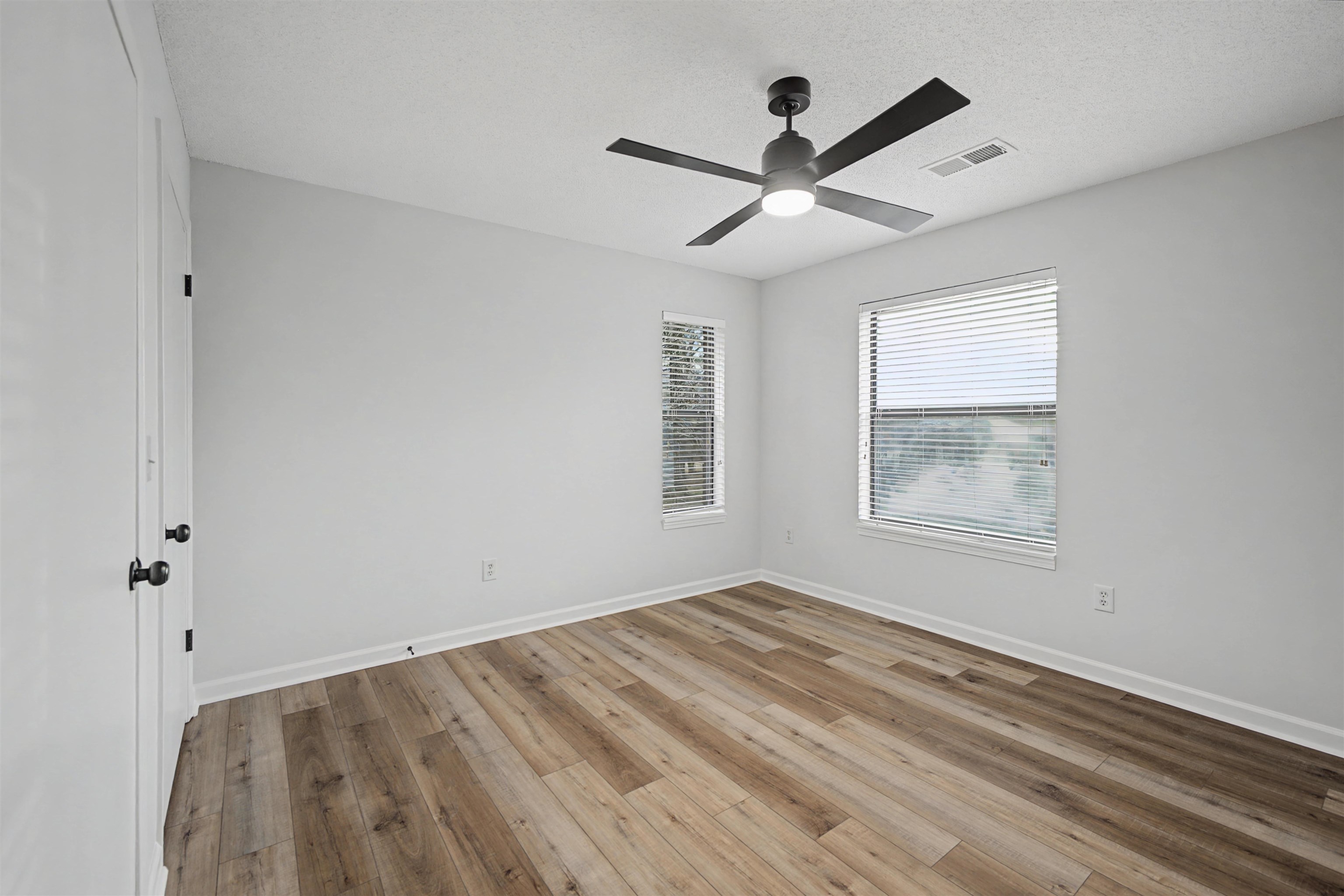 632 Cullum Road Munford, TN 38058 - Photo 30 of 38 Unfurnished room with light wood finished floors and a ceiling fan