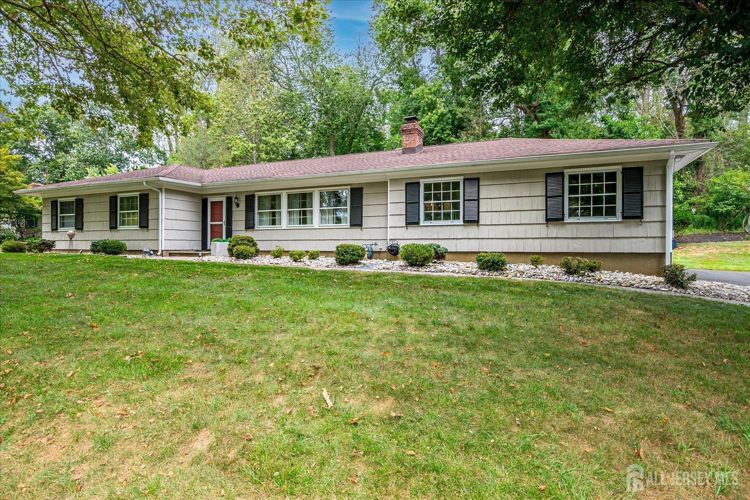 240 Dwight Road Middletown, NJ 07748 - Photo 1 of 28 a front view of house with yard and green space