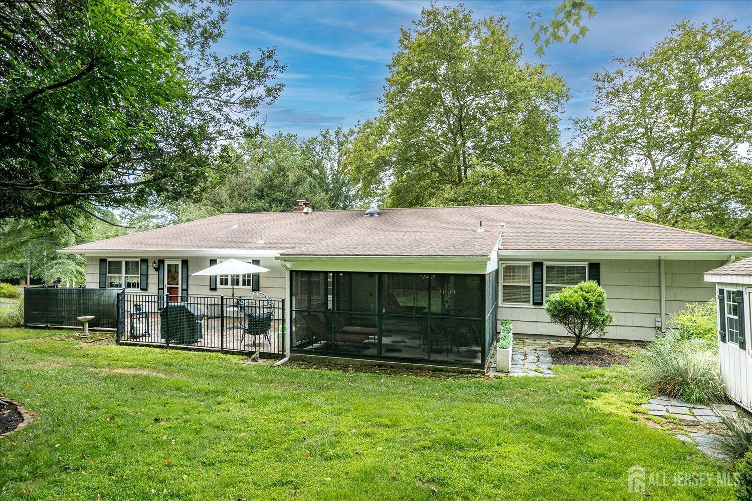 240 Dwight Road Middletown, NJ 07748 - Photo 11 of 28 a view of a house with a yard
