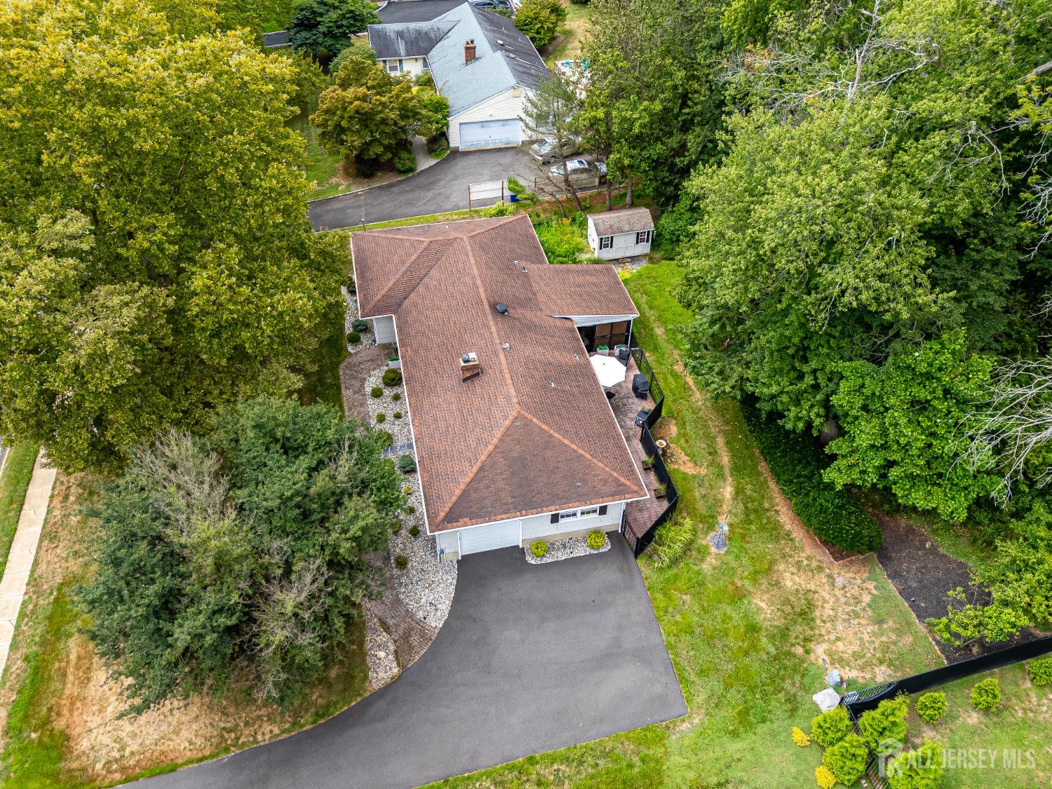 240 Dwight Road Middletown, NJ 07748 - Photo 6 of 28 an aerial view of a house with a yard