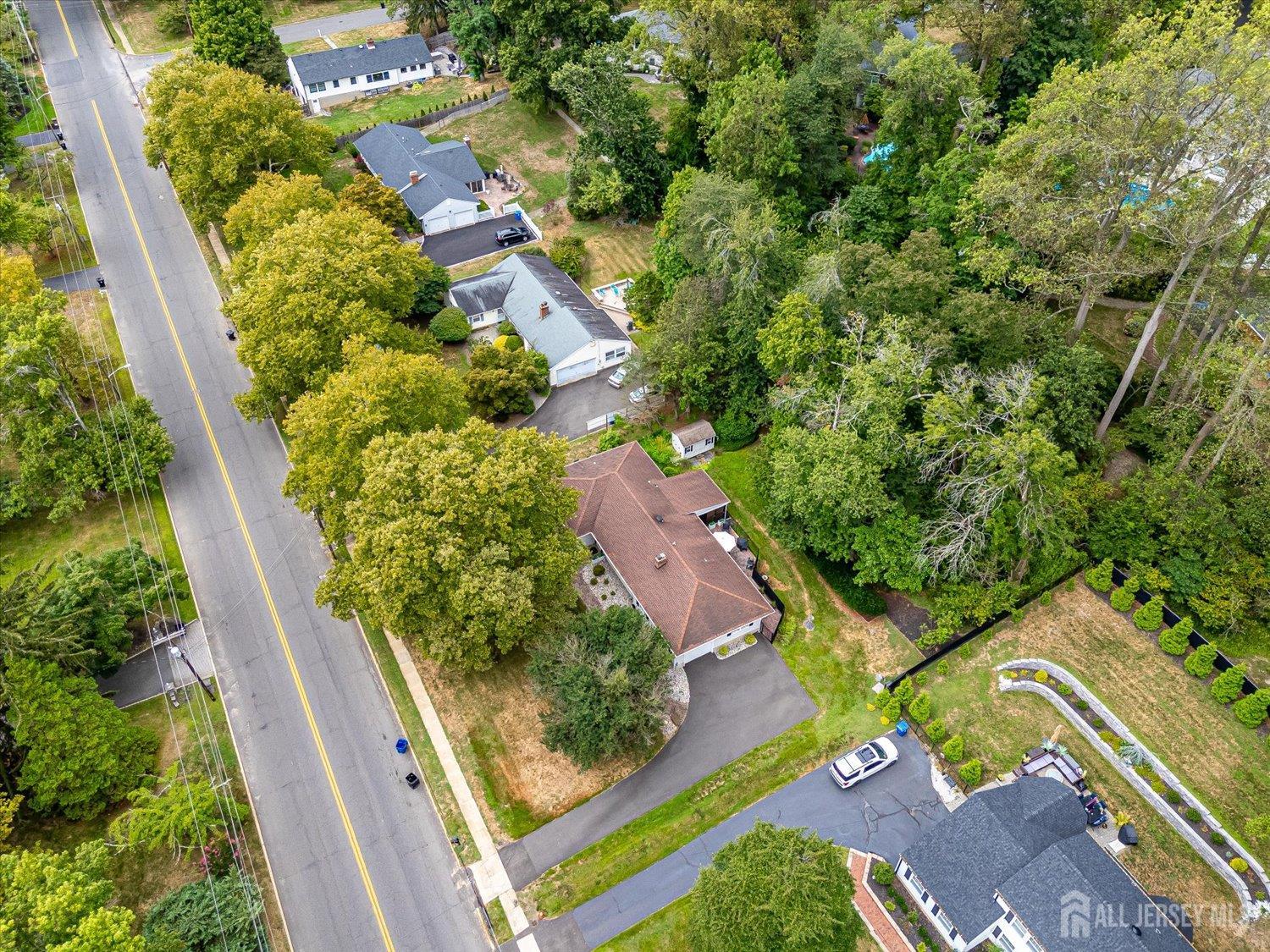 240 Dwight Road Middletown, NJ 07748 - Photo 10 of 28 an aerial view of a house with a yard