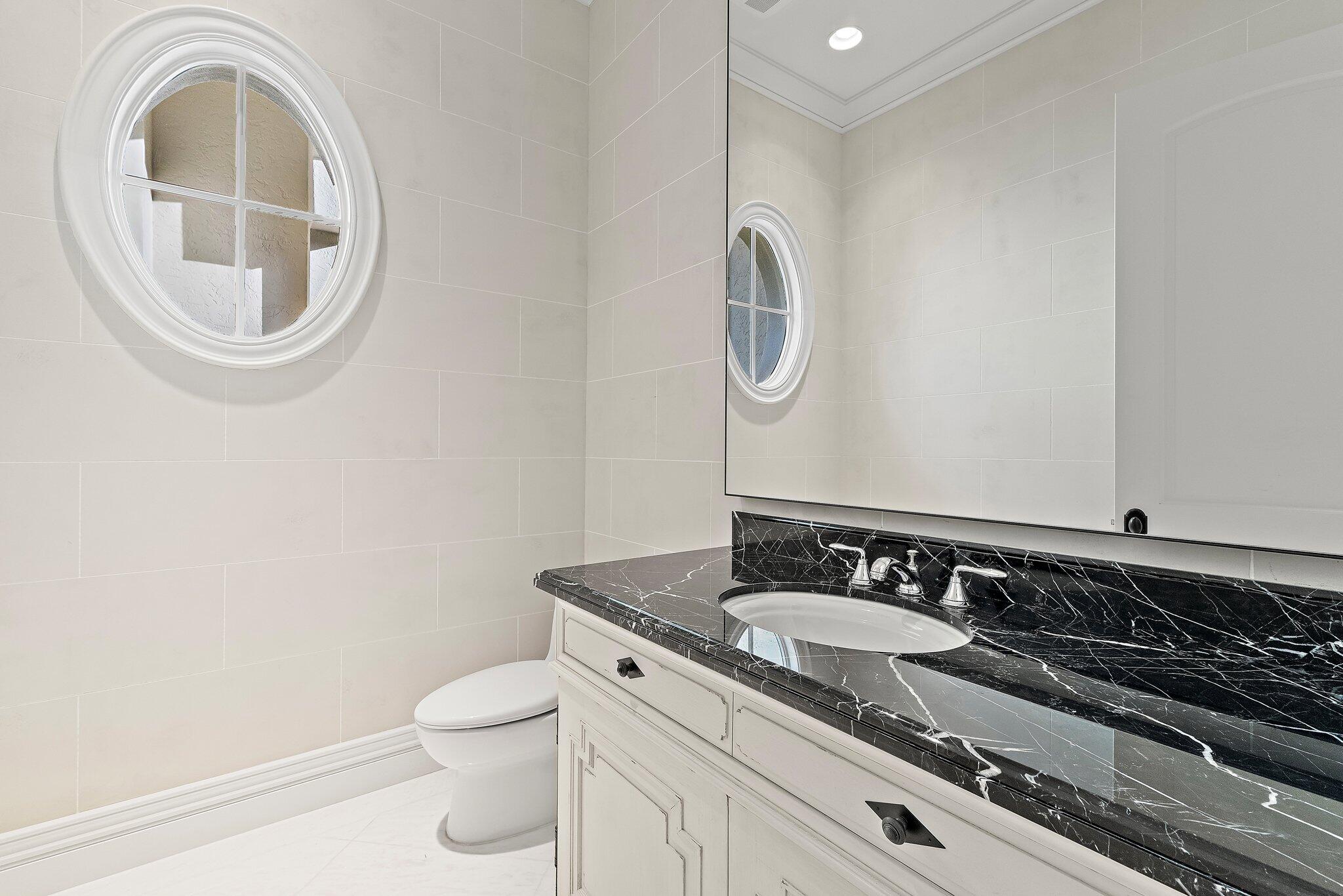 146 Bears Club Drive Jupiter, FL 33477 - Photo 102 of 115 Powder Room off of Family Room