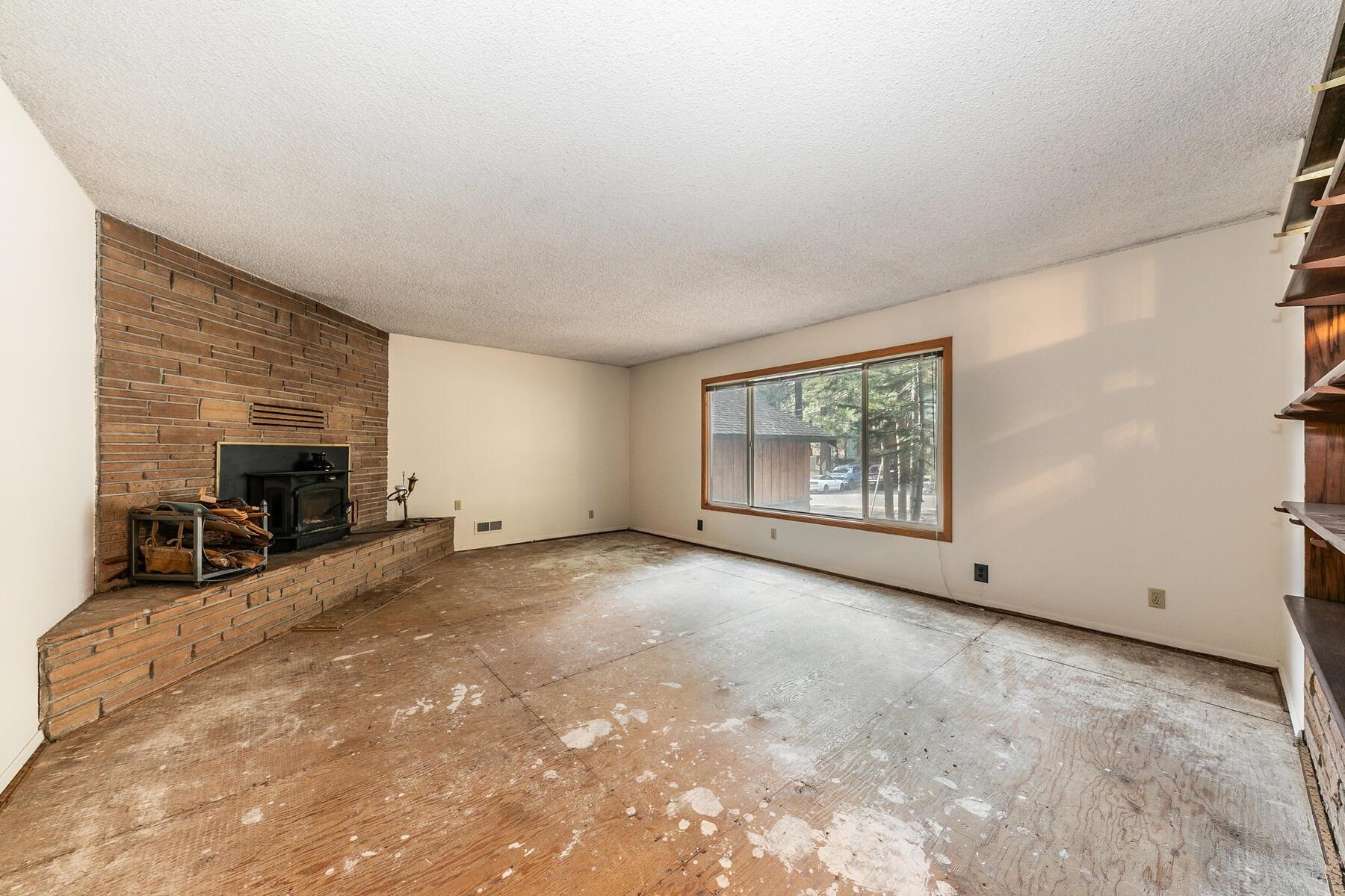 10191 Donner Trail Road Truckee, CA 96161 - Photo 17 of 21 a view of a livingroom with furniture and a fireplace