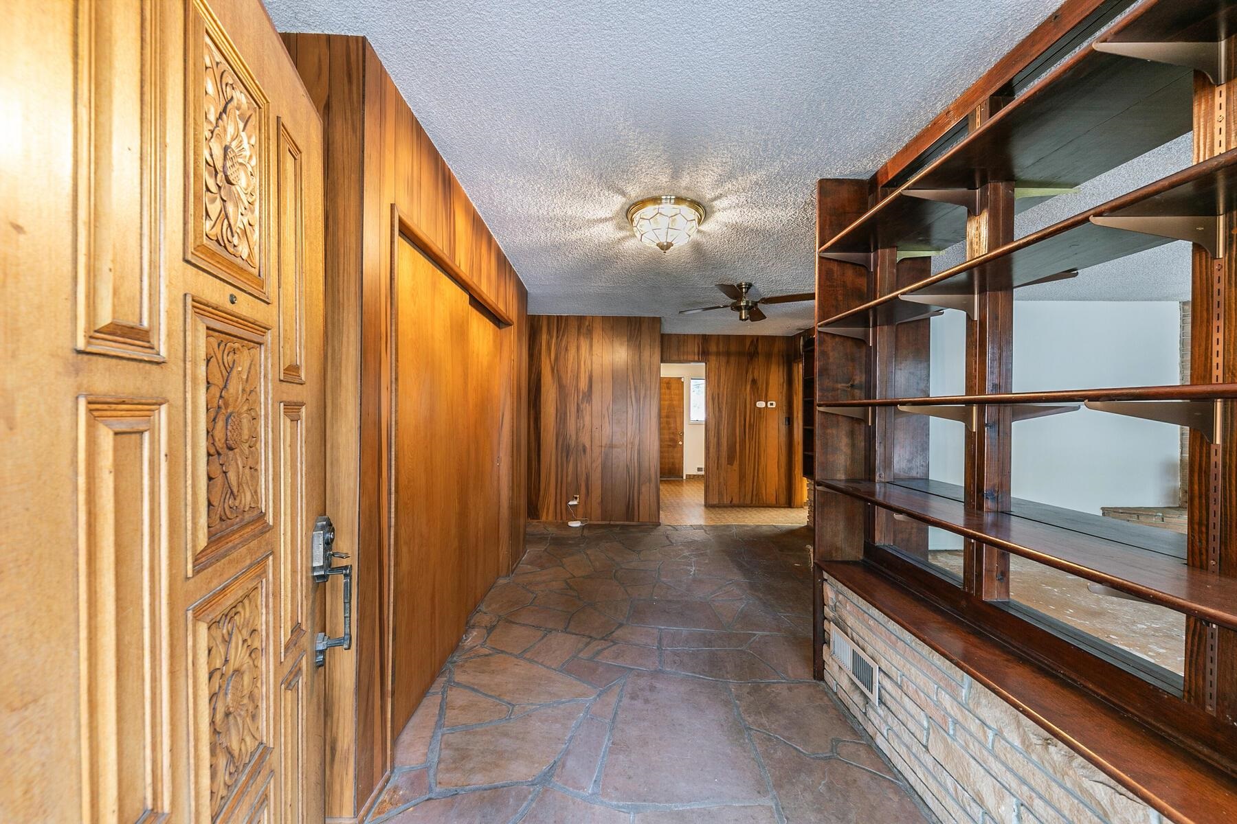 10191 Donner Trail Road Truckee, CA 96161 - Photo 10 of 21 a view of a hallway with wooden floor and staircase