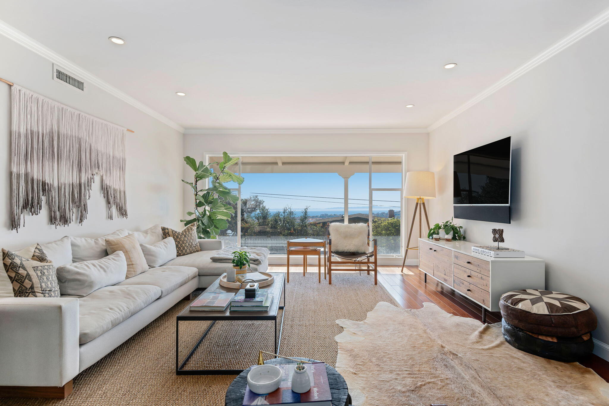 712 Arbolado Road Santa Barbara, CA 93103 - Photo 12 of 28 a living room with furniture and a flat screen tv