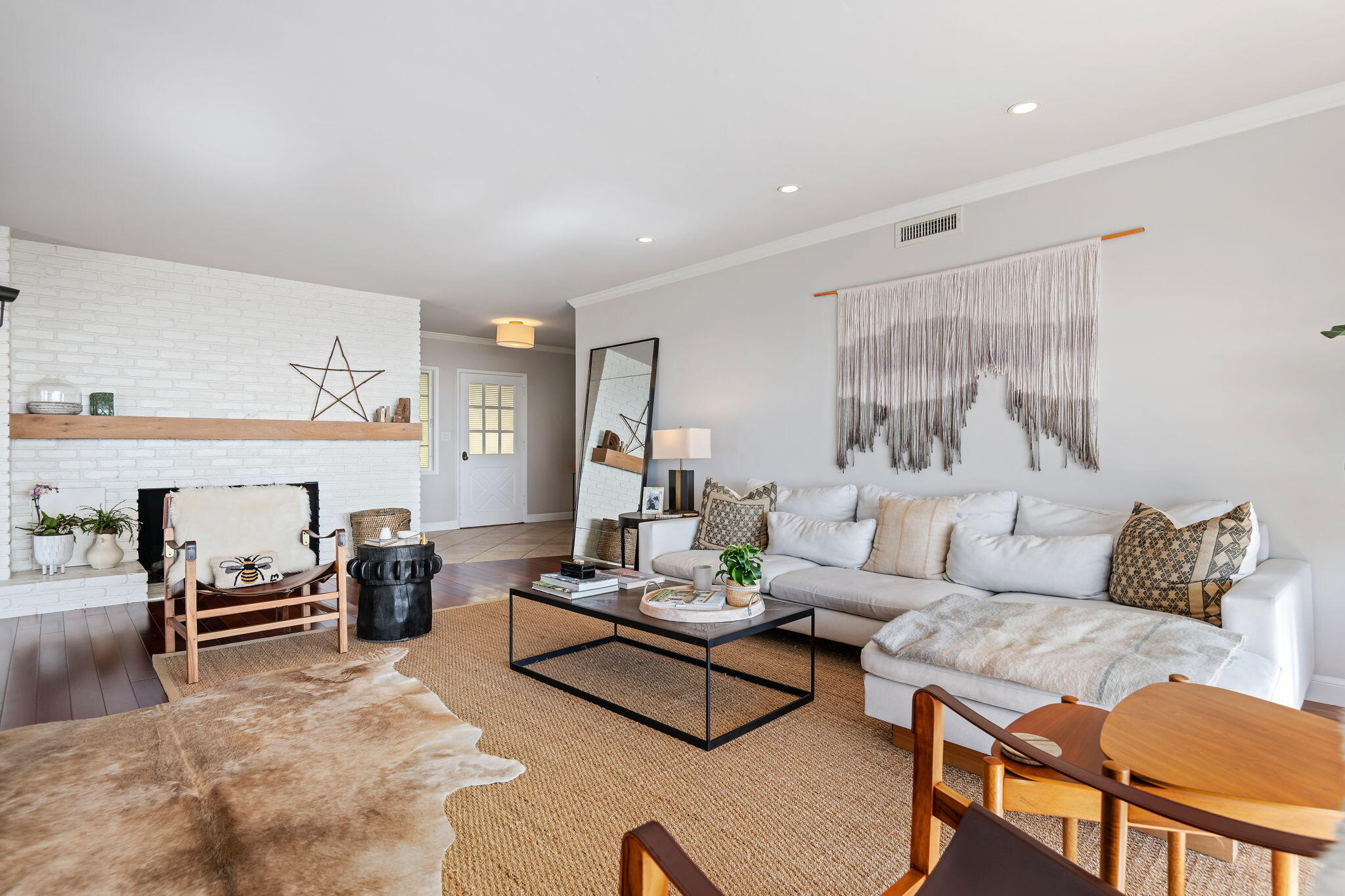 712 Arbolado Road Santa Barbara, CA 93103 - Photo 14 of 28 a living room with furniture and a couch