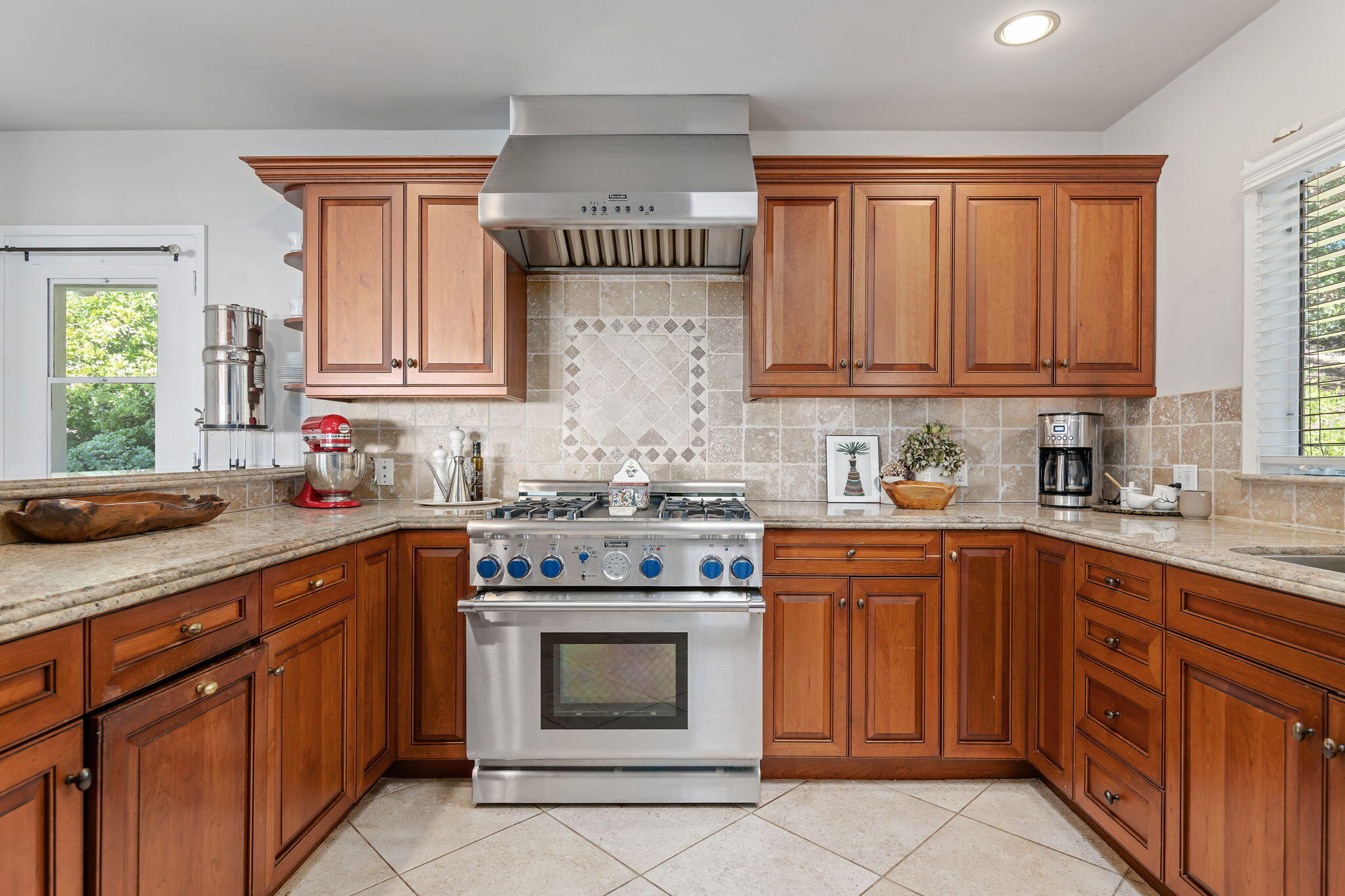 712 Arbolado Road Santa Barbara, CA 93103 - Photo 17 of 28 a kitchen with granite countertop a sink stainless steel appliances and cabinets