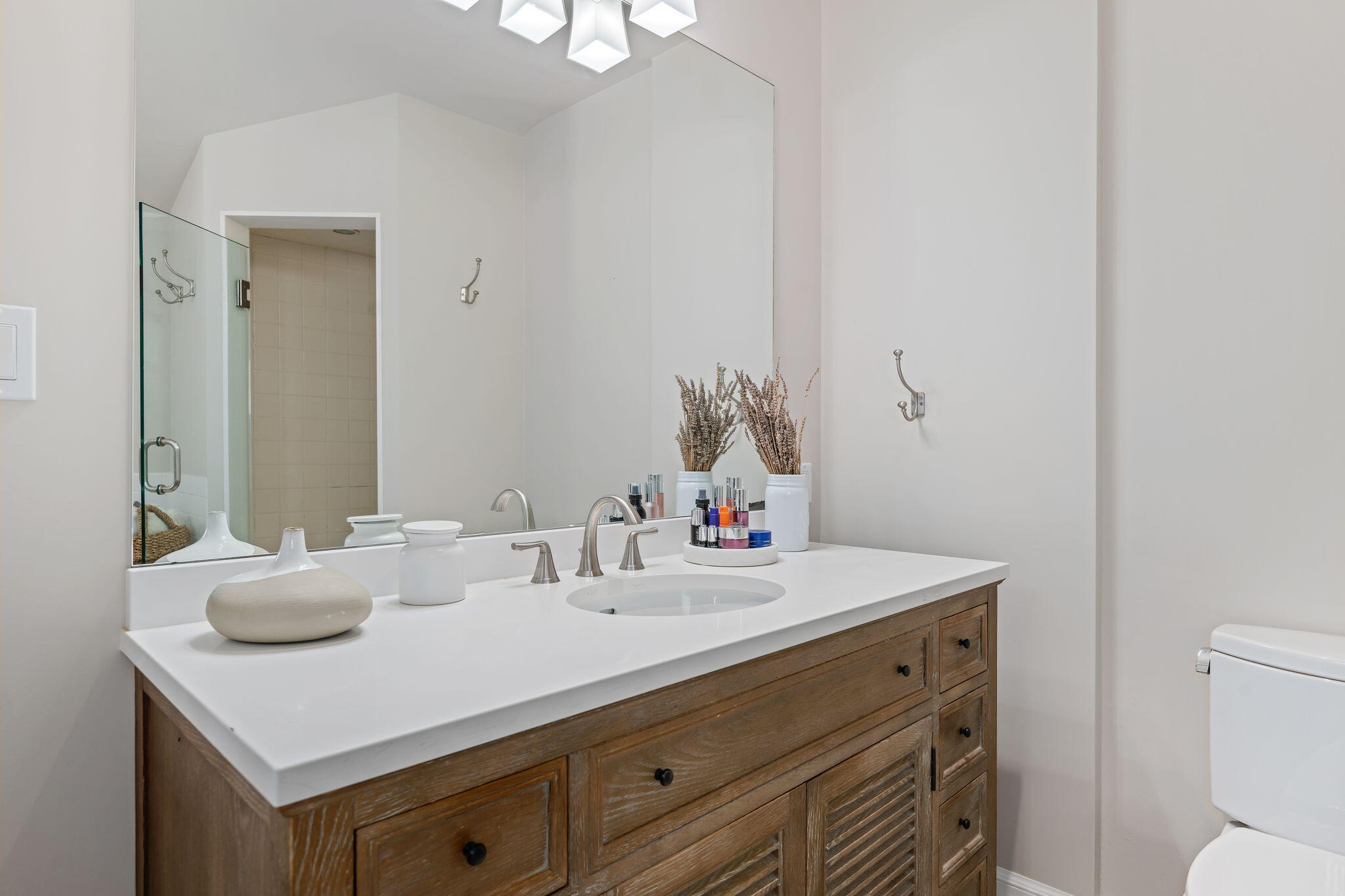 712 Arbolado Road Santa Barbara, CA 93103 - Photo 22 of 28 a bathroom with a sink and a toilet