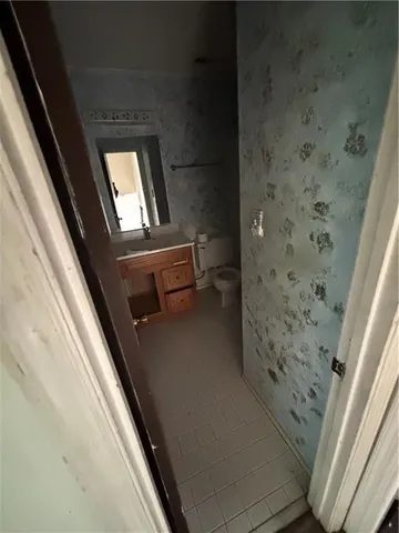 a view of a backyard with sitting area