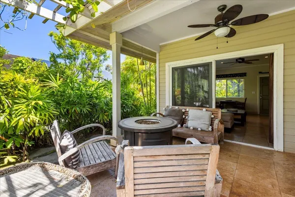 a outdoor space with patio the couches and a dining table with garden view